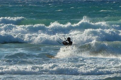 Man surfing in sea