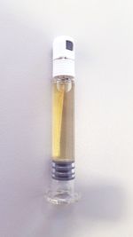 Close-up of wine glasses on table