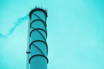 Low angle view of chimney against building