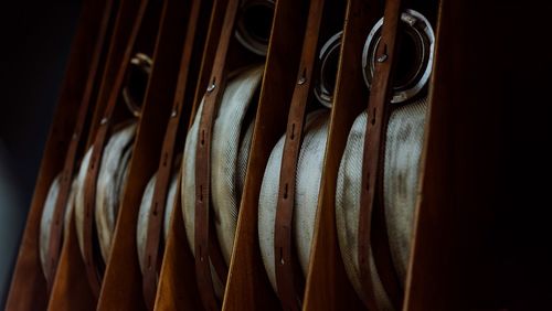 Close-up of clothes hanging on wood