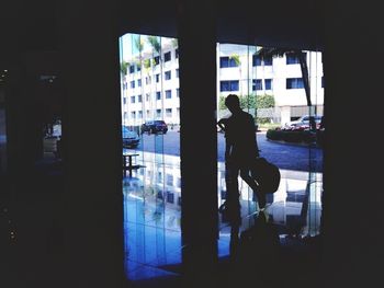 Woman standing in city