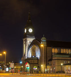 Low angle view of illuminated building at night