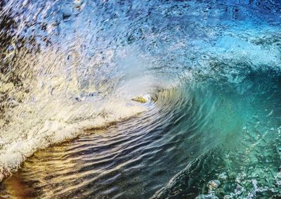 High angle view of surf on beach