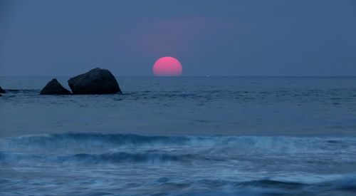 Scenic view of sea against clear sky