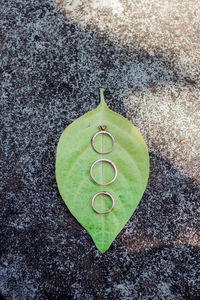 High angle view of heart shape on pebbles