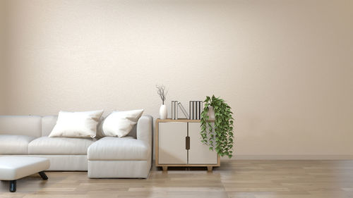 Potted plant on table at home