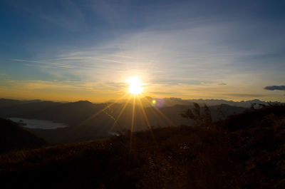 Scenic view of mountains against sky during sunset
