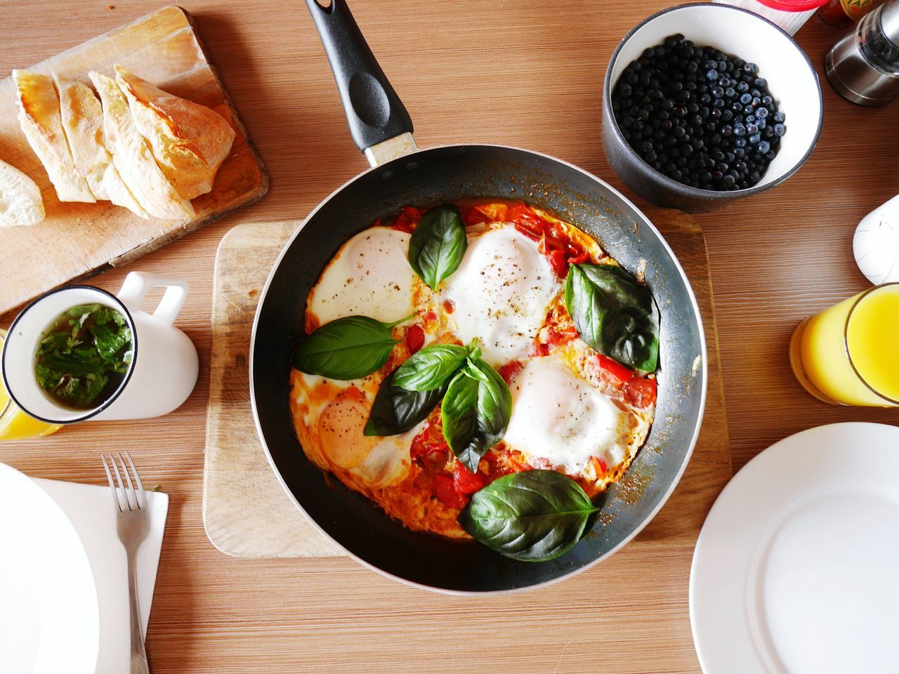 egg, food and drink, food, table, breakfast, plate, healthy eating, freshness, bowl, indoors, vegetable, tomato, meal, fork, directly above, omelet, no people, ready-to-eat, fried egg, egg yolk, close-up, day