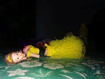 Close-up of yellow toys on table