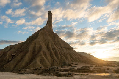 Desert against sky during sunset