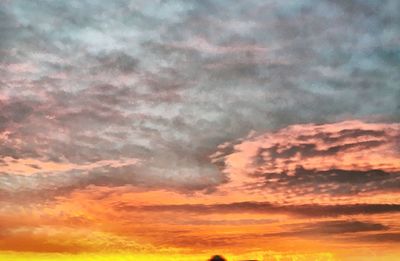 Scenic view of dramatic sky during sunset