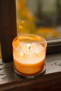 Candle and autumn decor. autumn home decor. cozy fall mood.