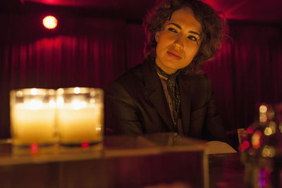 Woman enjoying a drink at a bar