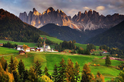 Scenic view of landscape and mountains against sky