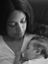 Portrait of cute mother with baby