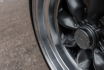 Close-up of vintage car on street