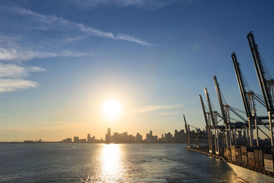 View of cityscape against sky during sunset