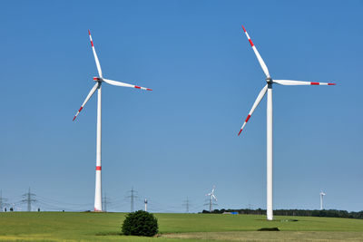 Modern wind energy turbines on a sunny day in germany