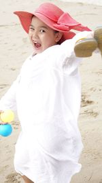 Portrait of happy girl at beach