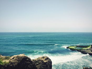 Scenic view sea against clear sky