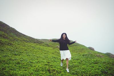 Woman running on mountain