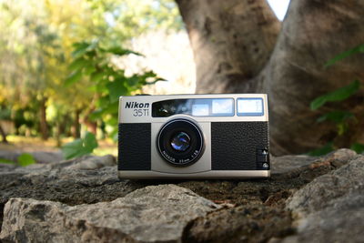 Close-up of camera on rock