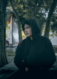 Portrait of a young man looking away