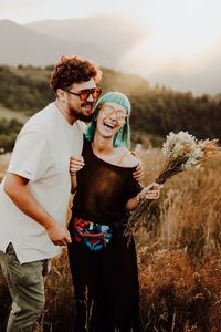 Young couple standing on land