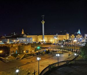 Illuminated buildings in city at night