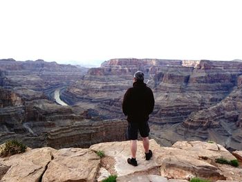 Tourists on rock formation