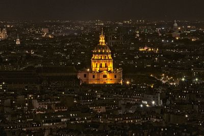 Illuminated buildings in city at night