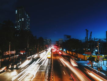 Light trails on road at night