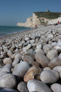 Rocks on beach against sky