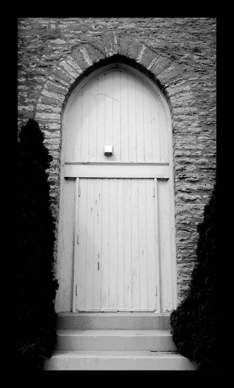 built structure, architecture, door, building exterior, transfer print, entrance, closed, auto post production filter, house, window, doorway, wood - material, arch, tree, day, protection, no people, safety, outdoors, facade