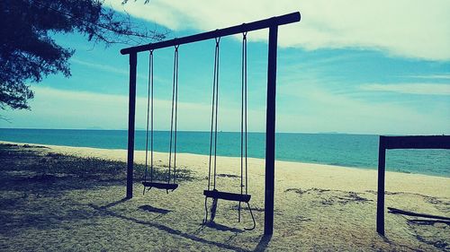 Scenic view of beach against sky