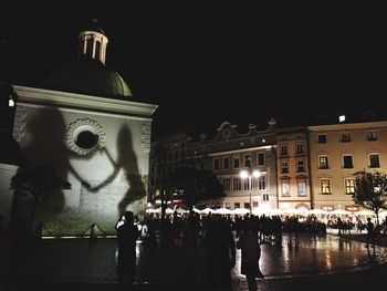 People in city at night