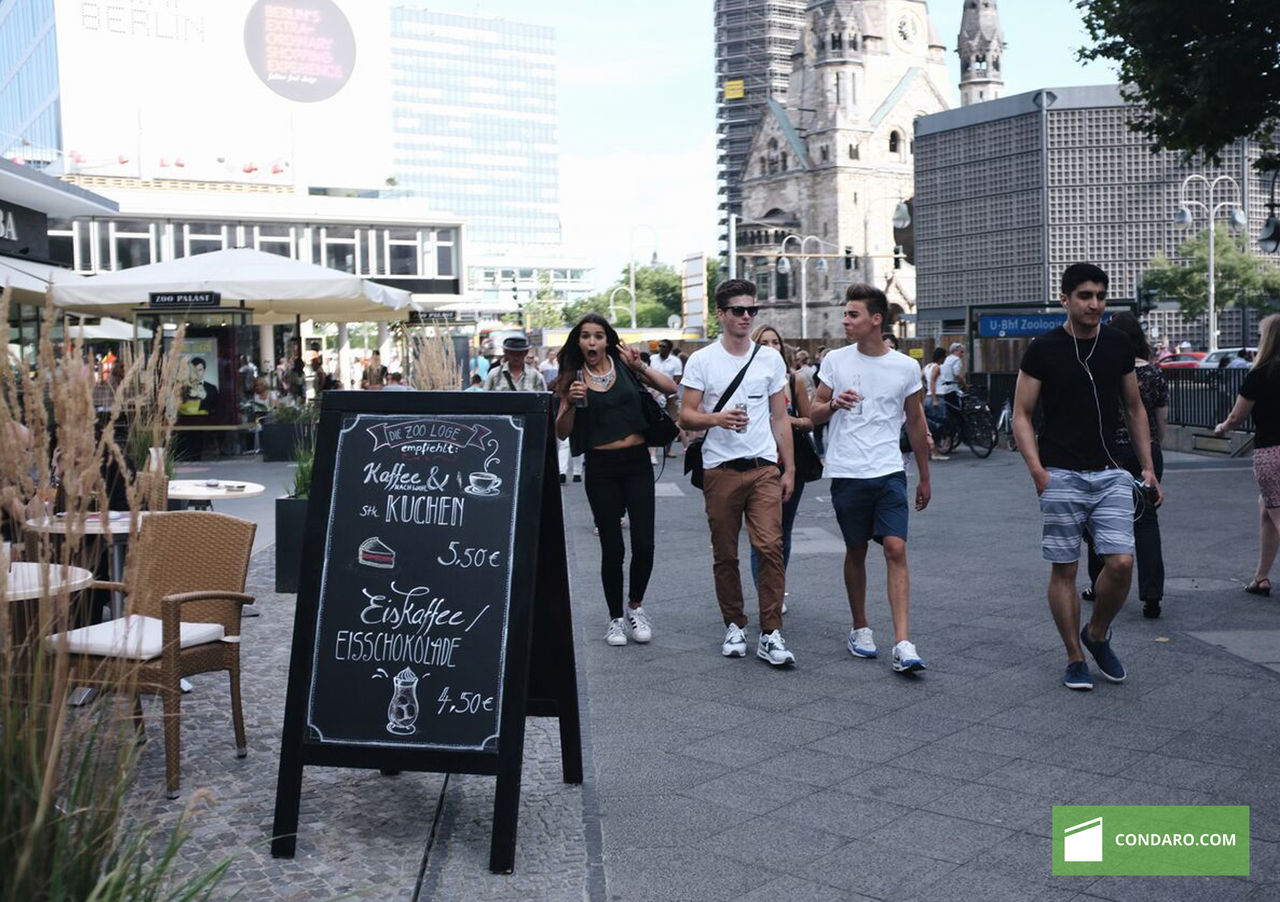 PEOPLE STANDING IN CITY