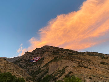 Scenic view of mountain against sky during sunset