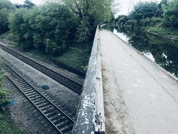 High angle view of railroad tracks by trees