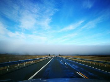 Road against blue sky