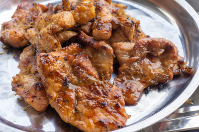 High angle view of meat in plate on table