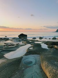 Scenic view of sea against sky at sunset