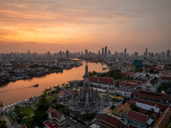 High angle view of townscape against sky during sunset