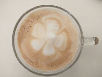 Directly above shot of cappuccino on table