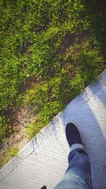 Low section of person standing on ground