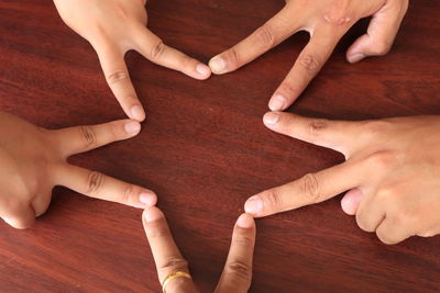 High angle view of hands