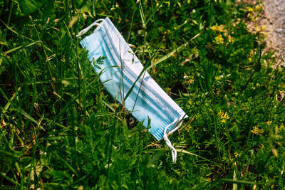 High angle view of bottle on field