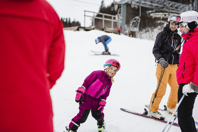 Skiing girl on slope