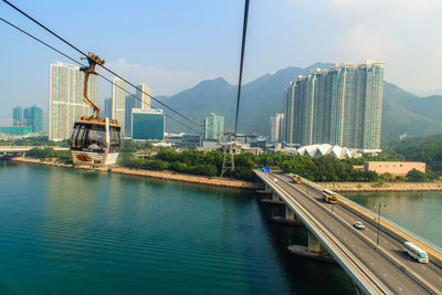 View of bridge over river with city in background