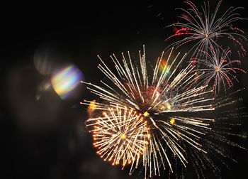 Firework display at night